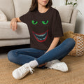 Creepy Grin Graphic T-Shirt — Green Eyes & Sinister Smile Halloween Tee